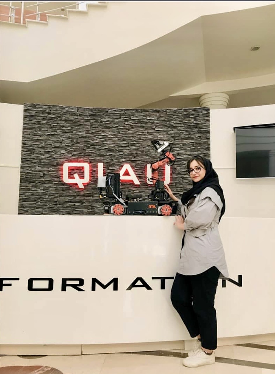 Parniyan Ghaleei with Robot